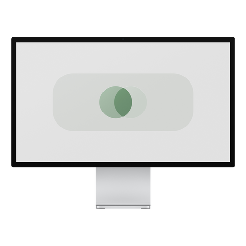 Green Colorful Circles geometric wallpaper displayed on a desktop monitor